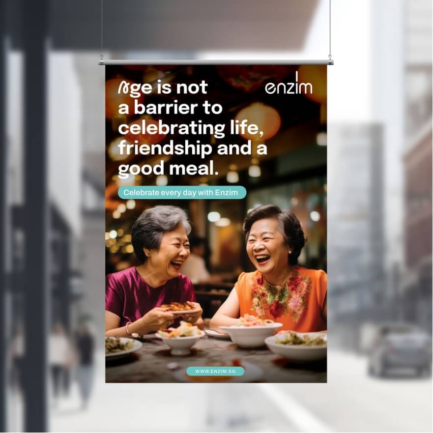 Two elderly women laughing over a meal at a restaurant; ad text: 'Age is not a barrier to celebrating life, friendship and a good meal.'